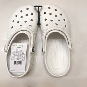 White crocs size women size 6/ Men size 4